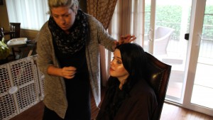 Stylist Ericka Sheckells works her magic on actress Raiven Lynn to get her ready for the shoot.