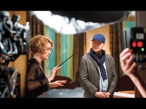 Director David Yates supervises Alison Sudol's magic tricks.